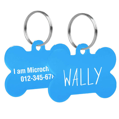 Custom engraved bone-shaped dog tags with clear text engraving