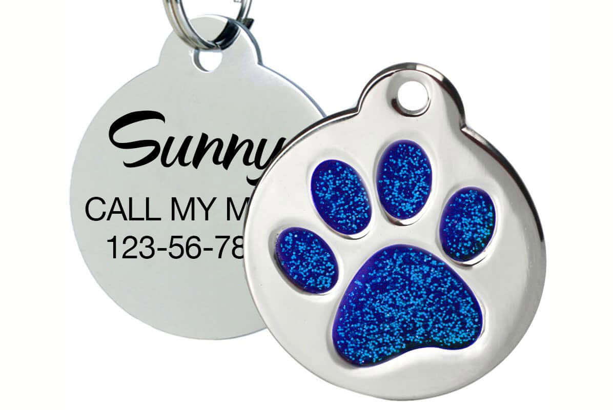 Engraved pet tag with glitter paw design for custom pet ID