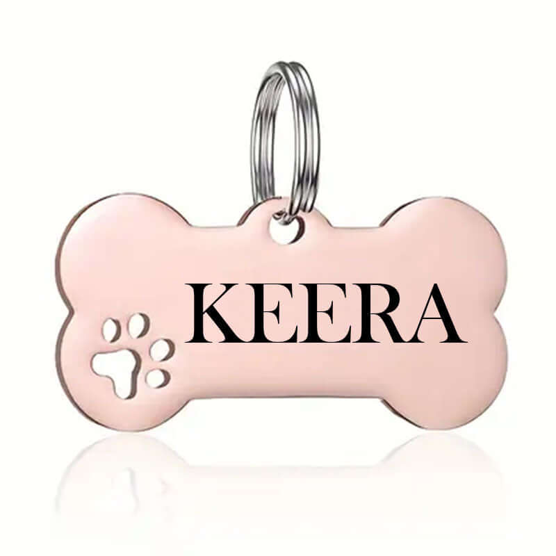 Bone dog tag with custom paw print engraving for pet ID