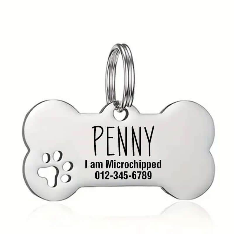 Bone dog tag with custom paw print engraving for pet ID