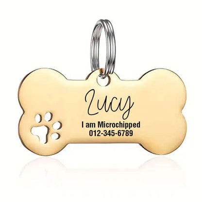 Bone dog tag with custom paw print engraving for pet ID