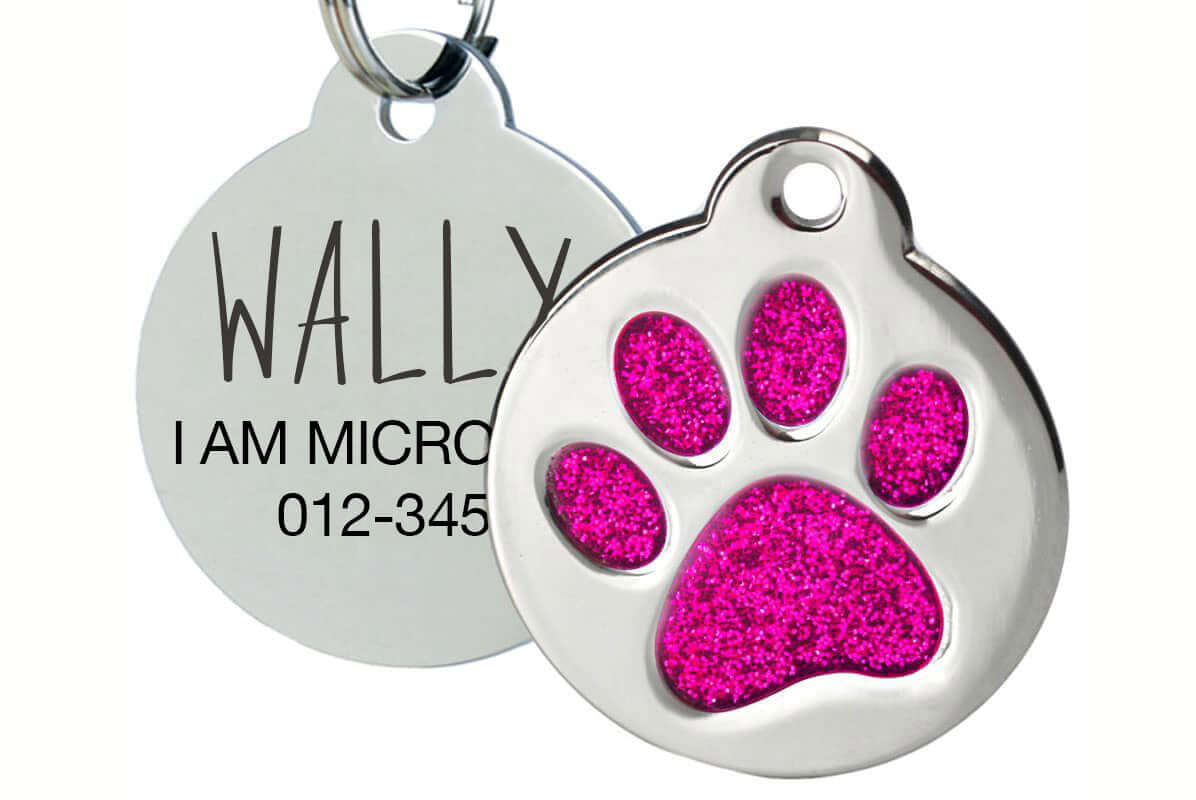 Engraved pet tag with glitter paw design for custom pet ID