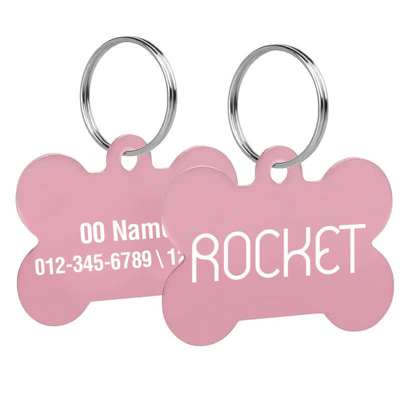 Custom engraved bone-shaped dog tags with clear text engraving