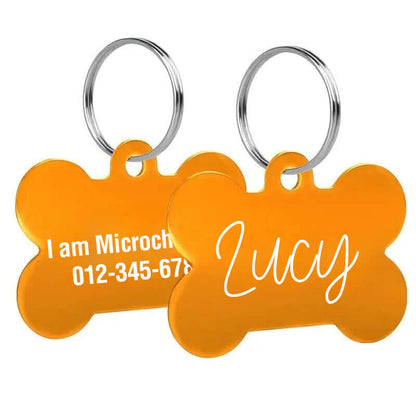 Custom engraved bone-shaped dog tags with clear text engraving