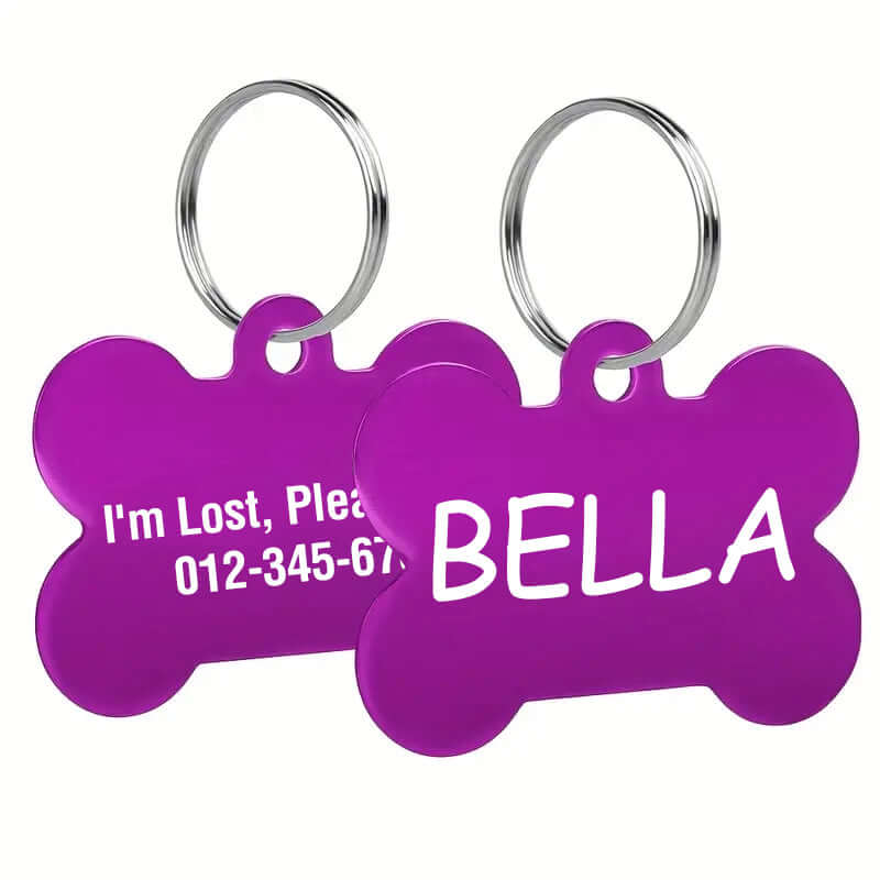 Custom engraved bone-shaped dog tags with clear text engraving