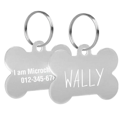 Custom engraved bone-shaped dog tags with clear text engraving