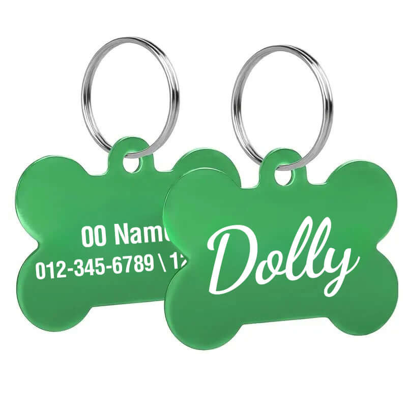 Custom engraved bone-shaped dog tags with clear text engraving